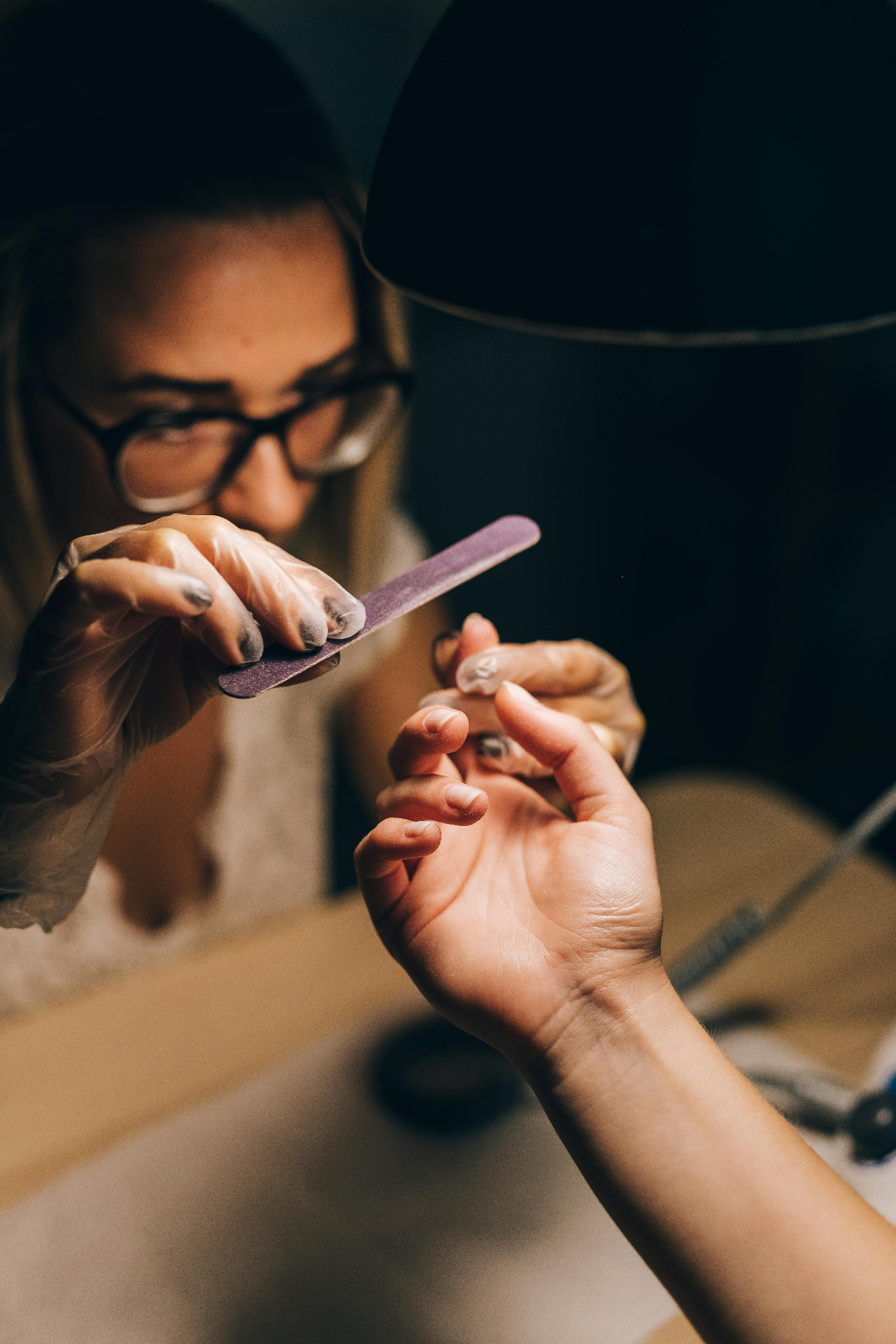 Nail technician working